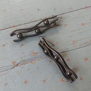 Metal Pointu's designer statement earrings